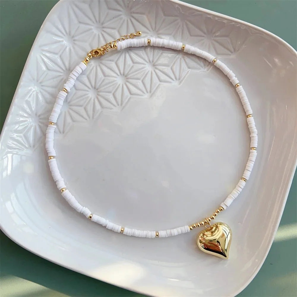 Choker boho con cuore in oro 18K