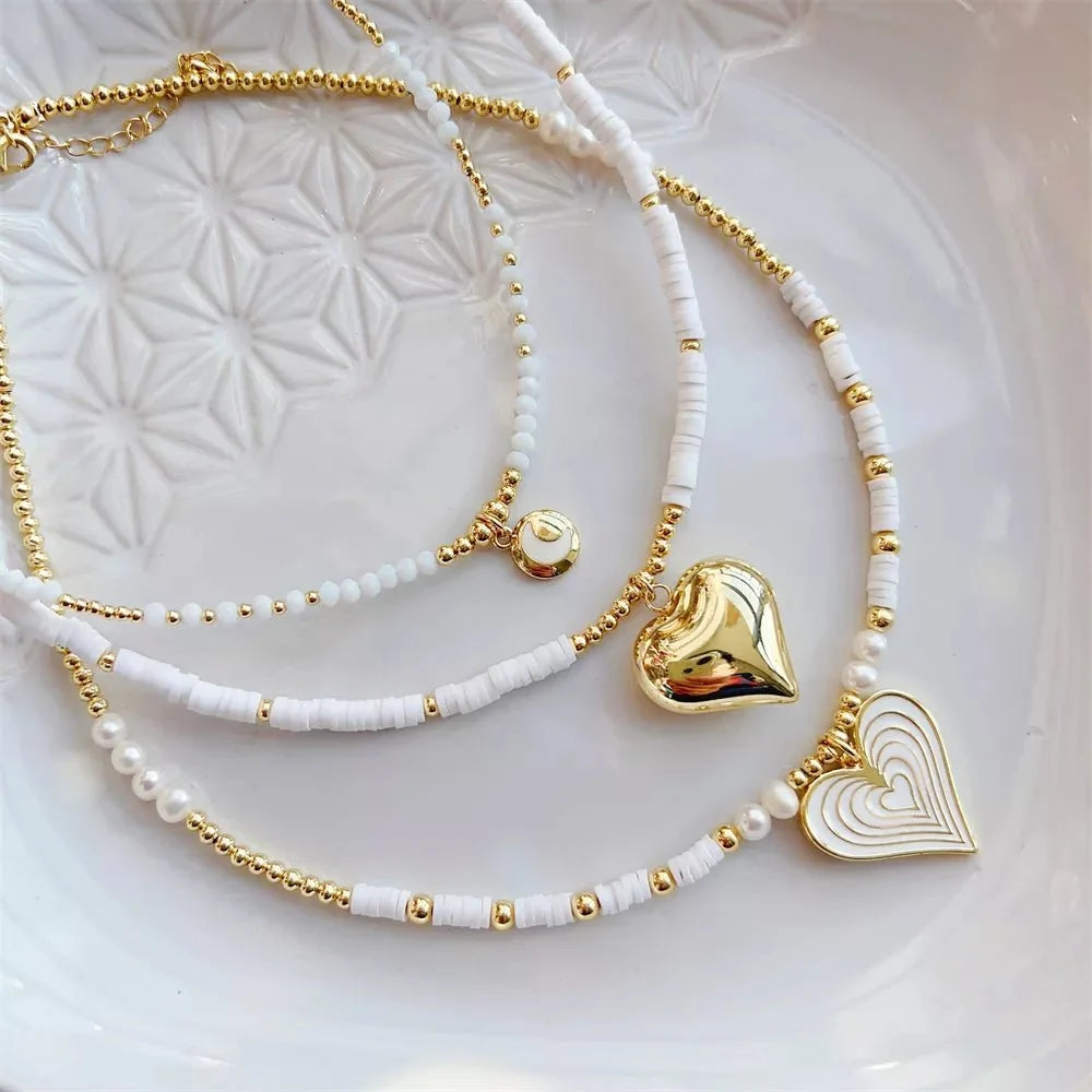 Choker boho con cuore in oro 18K