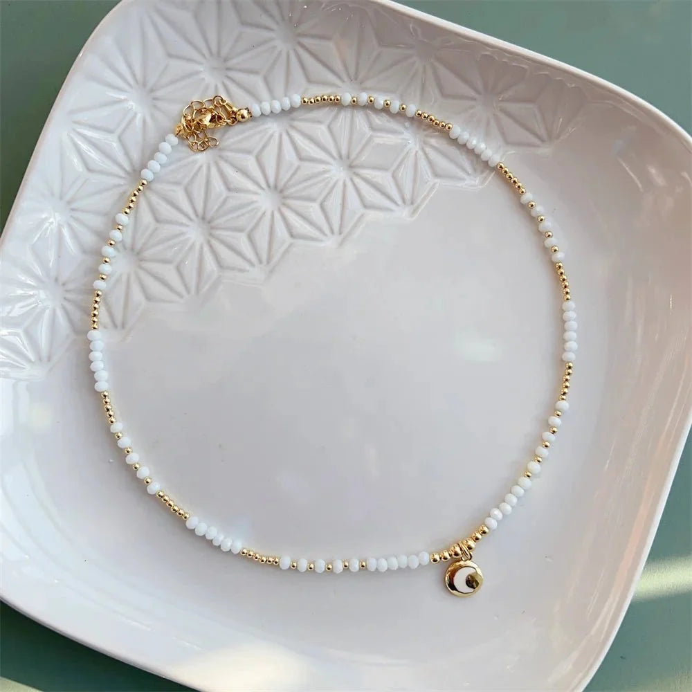 Choker boho con cuore in oro 18K