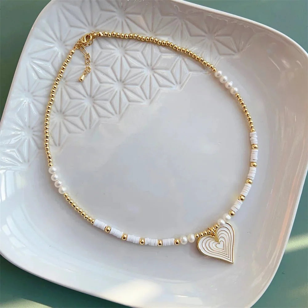 Choker boho con cuore in oro 18K