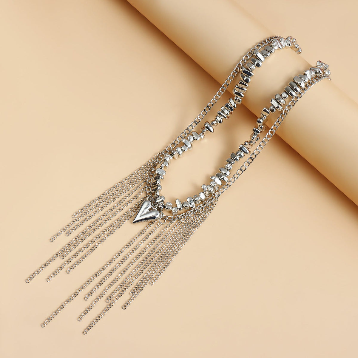 Ensemble de 2 colliers irréguliers en perles avec cœur