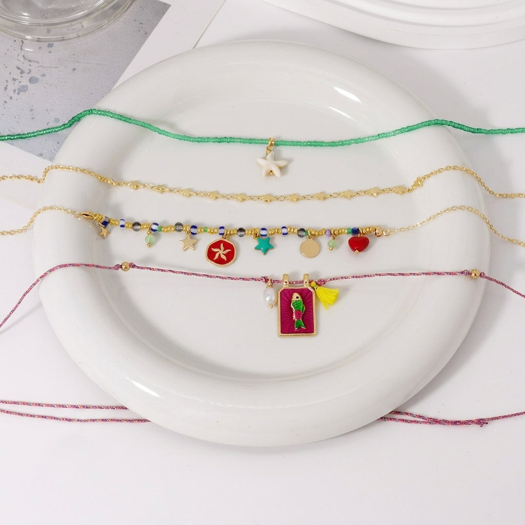 Ensemble de 4 colliers poissons tropicaux bohèmes