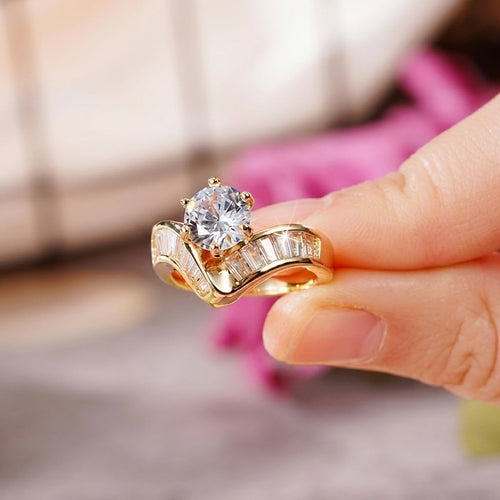 Bague ornée de diamants à taille baguette en V