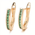 Emerald diamond earrings in gold