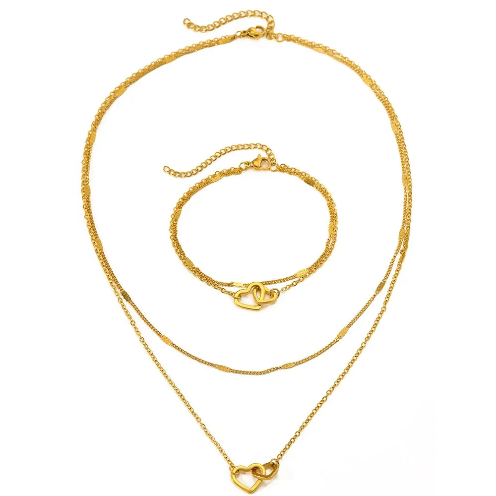 Juego de collar y pulsera con corazones dobles, eslabones curb y de cadena delicados