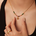 Collana delicata con pendente a sole di ispirazione boho