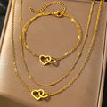 Juego de collar y pulsera con corazones dobles, eslabones curb y de cadena delicados