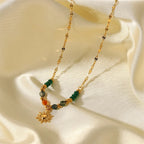 Collana delicata con pendente a sole di ispirazione boho