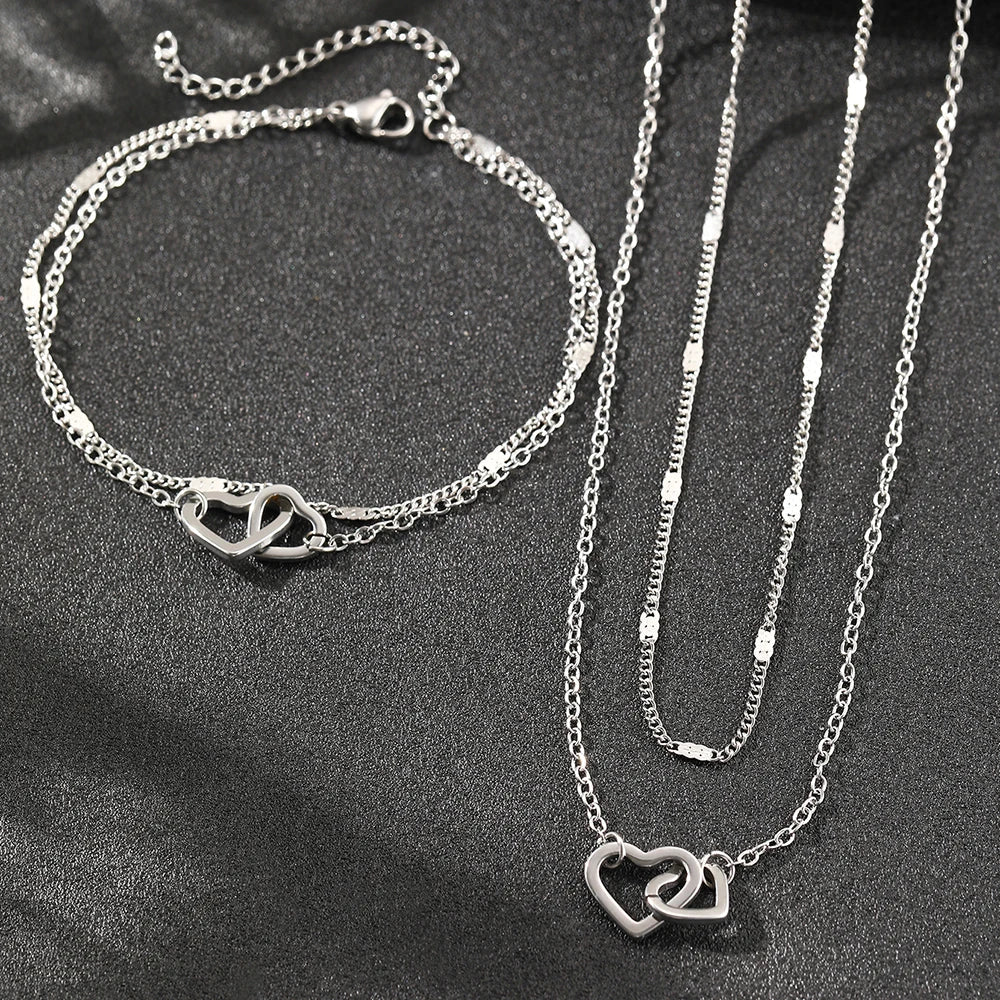 Juego de collar y pulsera con corazones dobles, eslabones curb y de cadena delicados