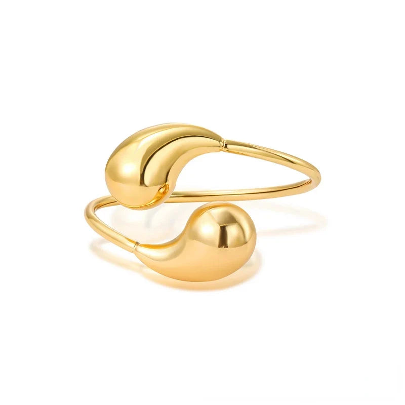 Wyrazista bransoletka typu bangle w kształcie kropli wody