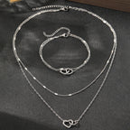 Juego de collar y pulsera con corazones dobles, eslabones curb y de cadena delicados