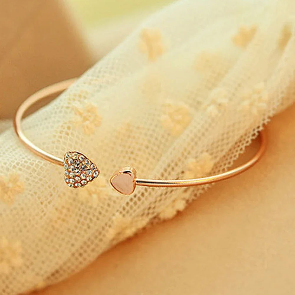 Bracelet jonc délicat à double cœur