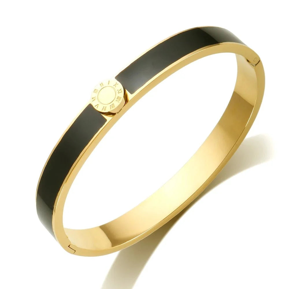 Elegancka bransoletka bangle z cyframi rzymskimi i pierścionkami