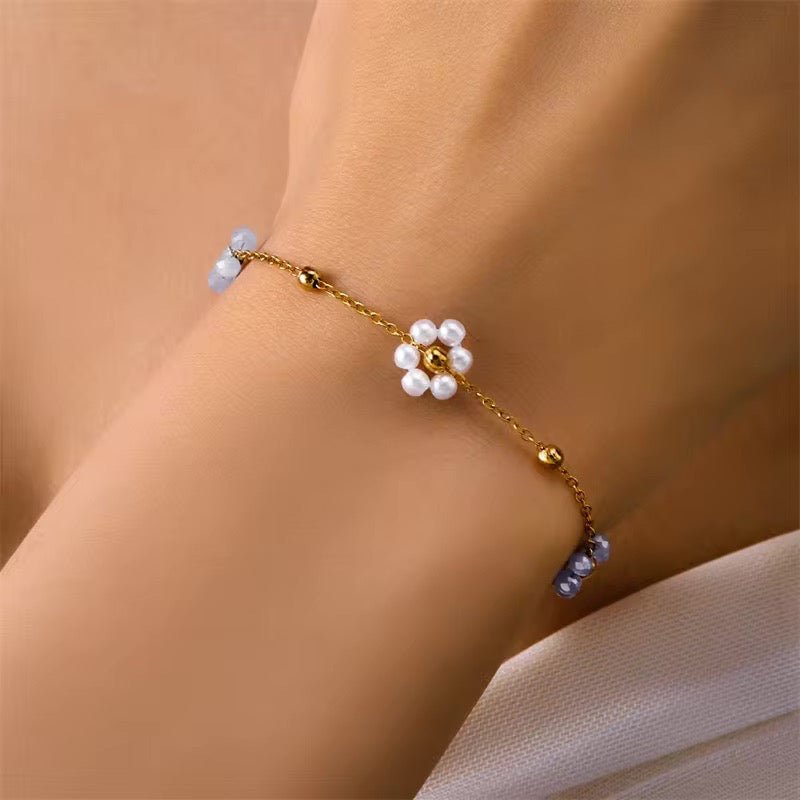 Collier et bracelets délicats à motif marguerite