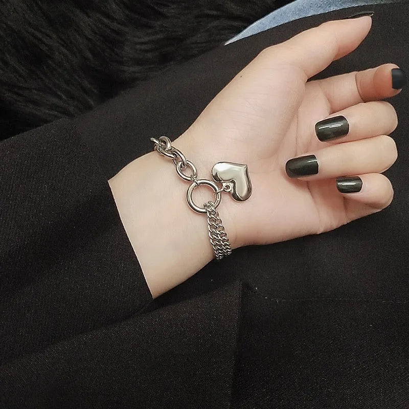 Warstwowa bransoletka z łańcuszkiem, ogniwami typu paperclip i serduszkiem