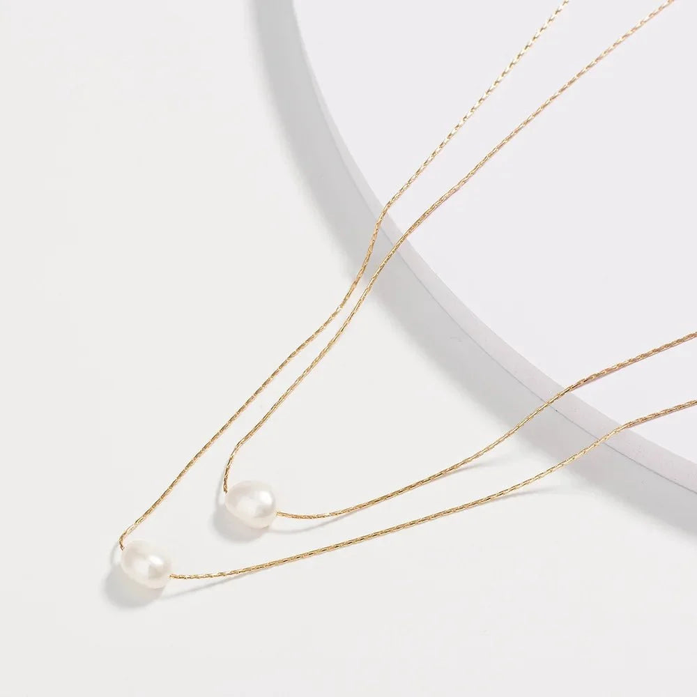 Collana delicata a strati con perle infilate