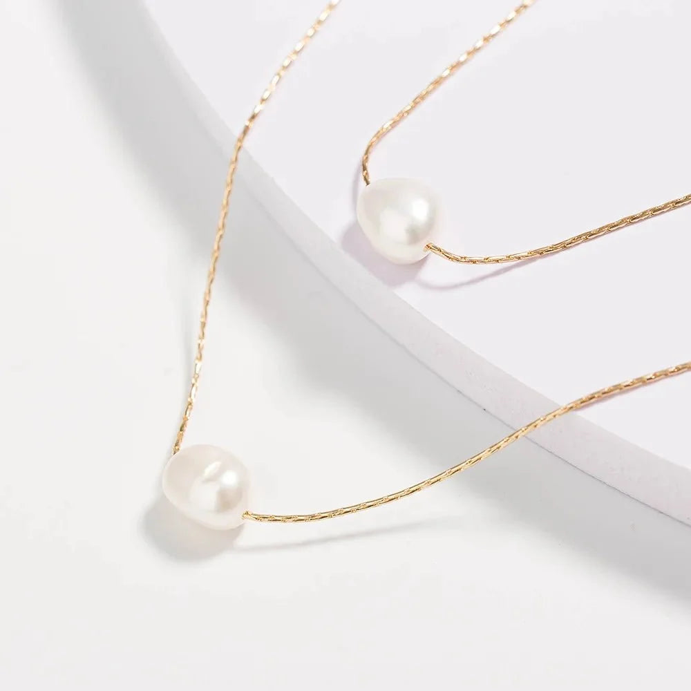 Collana delicata a strati con perle infilate