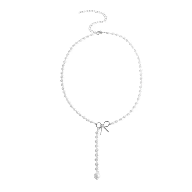Collana delicata a laccio con fiocco e perla